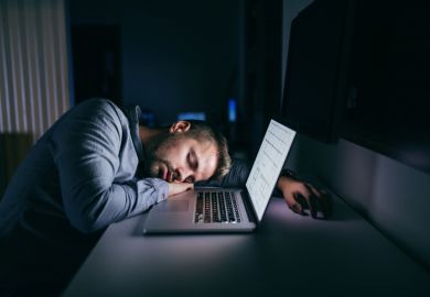Asleep at laptop