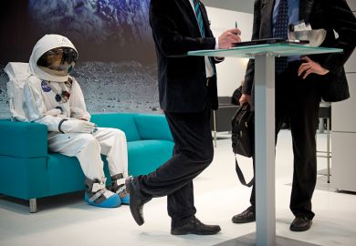 An astronaut sitting on a couch behind two business men