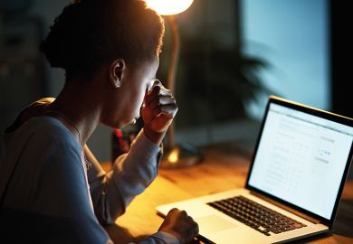 Black woman working on laptop Black woman working on laptop