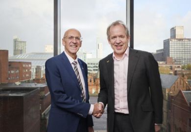 Vice-chancellors of Manchester universities shaking hands. Vice-chancellors of Manchester universities shaking hands.
