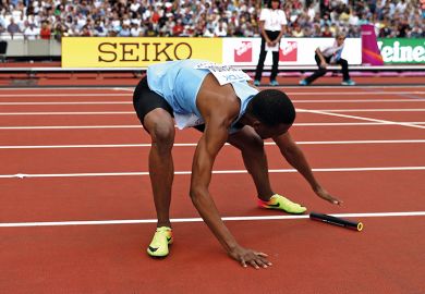 Relay runner with baton