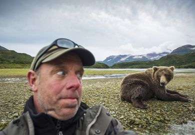man and bear