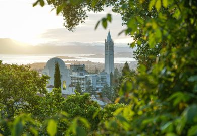 Beautiful view of Berkeley Skyline, including Sather Tower, or Campanile, and International House, with San Francisco Bay in the background.