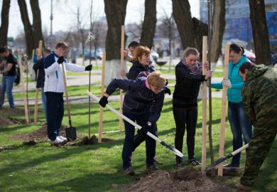 Belarus, Gomel, April 21, 2018. The Central District. Tree planting. Residents of the city plant trees