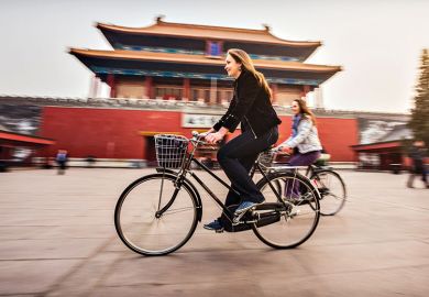 bike-past-asian-building