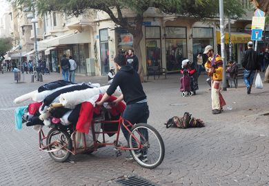 Bike transporting rolls of fabric