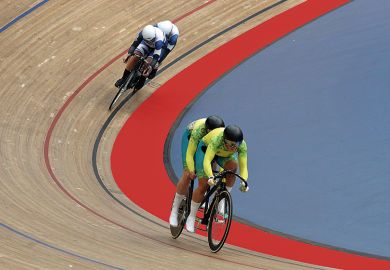 Two tandem teams race on cycle track Two tandem teams race on cycle track