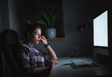 A woman stares at a blank screen, symbolising the difficulty of finding relevance in the digital era