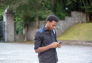 BME sutdent on mobile phone