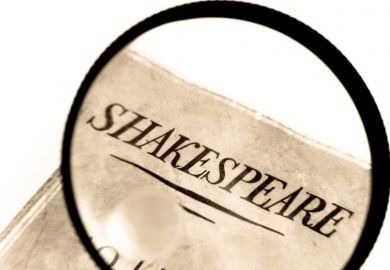 Book by Shakespeare under a magnifying glass Book by Shakespeare under a magnifying glass