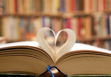 A book with its pages folded into a heart shape A book with its pages folded into a heart shape, symbolising publc support for universities