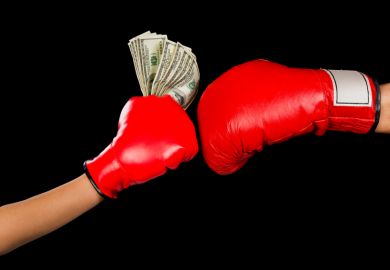 Boxing gloves and money Boxing gloves and money
