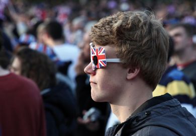 Boy wears Union Jack glasses Boy wearing Union Jack glasses