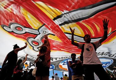 Professors and students protest against cuts to federal spending on higher education planned by Brazil’s President Jair Bolsonaro’s right-wing government in Brasilia in May 2019