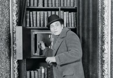 Man breaking into safe