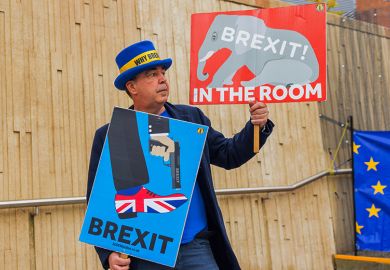 Steve Bray, famous brexit campaigner, holds up signs Brexit Elephant in the room and Brexit shooting self in foot as various different groups held demonstrations outside the ACC conference centre, 22 September, 2024.