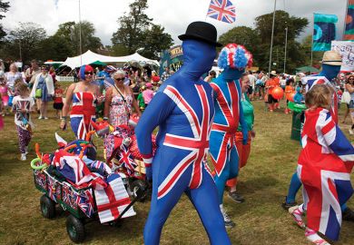 People in Union Jack costumes People in Union Jack costumes