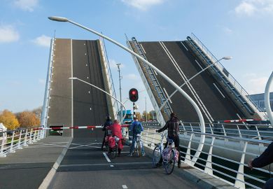 cyclists on bridge cyclists on bridge