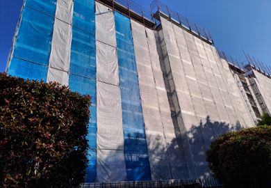 Building restoration with scaffolding, maintenance of residential apartments