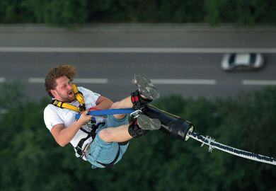 man bungee jumping