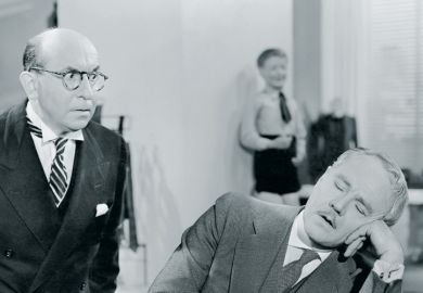 Businessman sleeping at desk