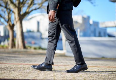 Businessman feet walking