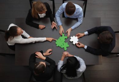 Businesspeople discussing how to reconnect