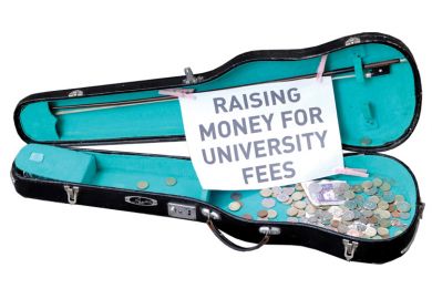 Busker's guitar case collecting money for university fees