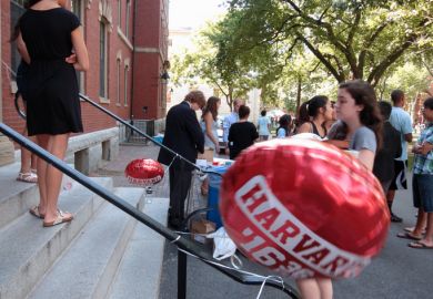 Cambridge, USA - August 27, 2012 Harvard University students welcoming freshmen in Cambridge, Massachusetts, USA on August 27, 2012