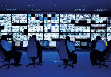 Control room with CCTV camera footage on screens Control room with CCTV camera footage on screens