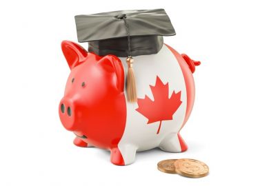 Canadian graduation A Canadian piggy bank wearing a mortarboard