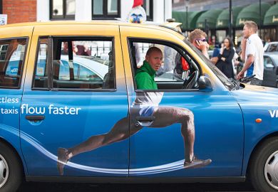 Taxi cab with advertisement on the side that adds body to driver's head, humorously Taxi cab with advertisement on the side that adds body to driver's head, humorously