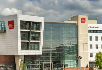 Cardiff, Wales - June 2019 Sign on the outside of the media department of the University of South Wales campus building in Cardiff city centre