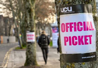 Cardiff, Wales - November 2019 Sign attached to a tree near an official picket line outside Cardiff University. It marks industrial action by members of the University and College Union. Cardiff, Wales - November 2019 Sign attached to a tree near an official picket line outside Cardiff University. It marks industrial action by members of the University and College Union.