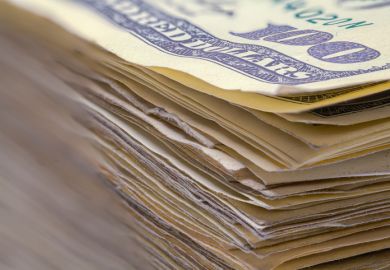 A pile of $100 dollar bills