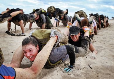 Human caterpillar on beach