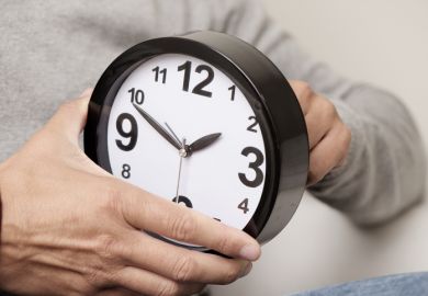 Time being changed on a clock Time being changed on a clock