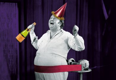 Man celebrates with champagne and party hat