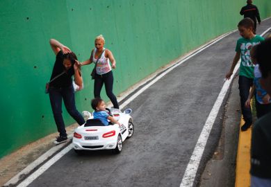 Child drives miniature car into people Child drives miniature car into people
