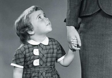 Child holding mother's hand Child holding mother's hand