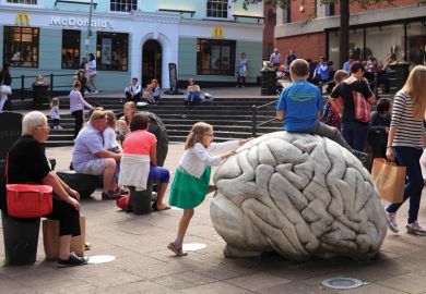 Children climbing on sculpture by-Anne and Patrick Poirier, Norwich, Norfolk Children climbing on sculpture by-Anne and Patrick Poirier, Norwich, Norfolk