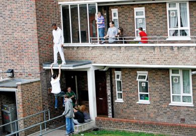 Children playing on UK council housing development Children playing on UK council housing development