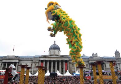 Chinese dragon performer in London