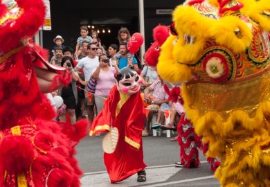 Chinese LionDragon dancers entertain Adelaide crowds during the Chinese New Year Rooster festival held in China Town.