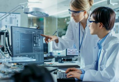 A Western and a Chinese scientist work together A Western and a Chinese scientist work together