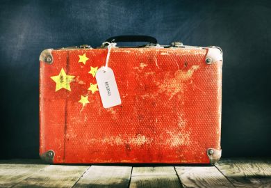 A suitcase with the Chinese flag on it illustrating opinion article on Chinese student flows to Western universities