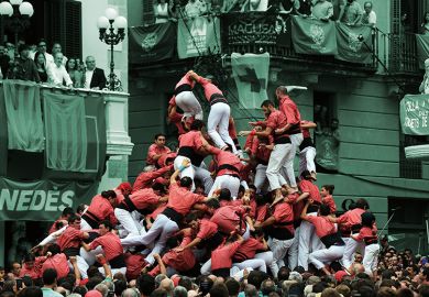 People fall as they attempt to form a “castell” during an exhibition of the human towers, or castells, in Vilafranca del Penedes, 2016 People fall as they attempt to form a “castell” during an exhibition of the human towers, or castells, in Vilafranca del Penedes, 2016