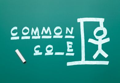 A blackboard with "common core" written on it A blackboard with "common core" written on it