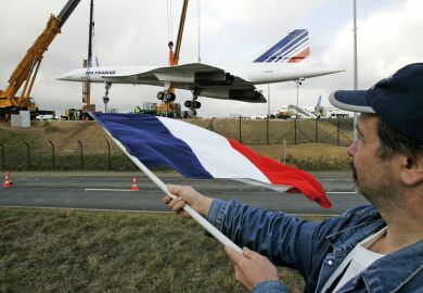 Concorde enthusiast waves French flag Concorde enthusiast waves French flag