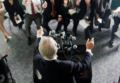 A man speaking at a news conference